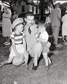 Displaying Prints: Captain Showing Children His Medal