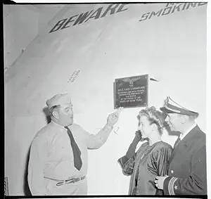 Captain Showing Plaque