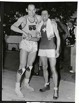 Captains of Olympic Basketball Teams Shaking Hands