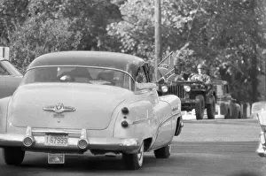 Car With Confederate Flag Hanging Out Window