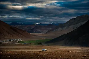 Coolbiere Collection Prints: Car driving in valley