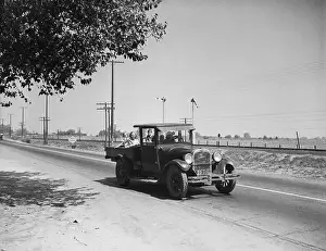 Visalia Prints: Car Full Of Kids and Peaches On Road