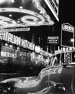 Car and Neon Lights in New York City