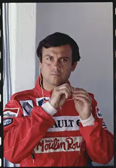 Formula One Prints: Car Racer Patrick Tambay Adjusting His Uniform