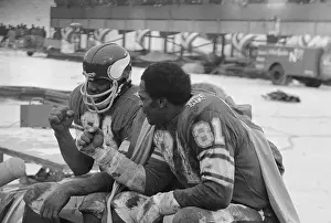 Carl Eller and Alan Page Clenching Fists