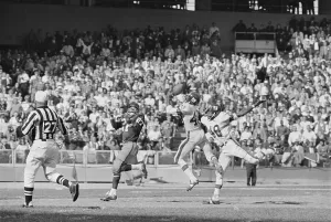 John A Prints: Carl Lockhart Intercepting a Pass