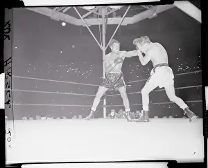 Carl Olson Boxing Against Archie Moore
