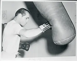 Carl Olson Hitting a Punching Bag
