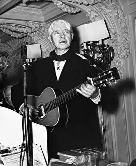 Folk Prints: Carl Sanburg Playing The Guitar