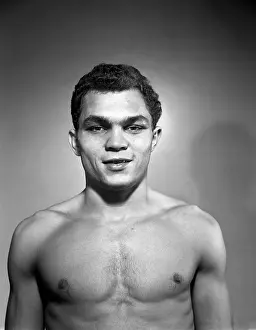 Prints of BRONX, NY - JANUARY 14: Lightweight professional boxer Carlos Ortiz of Puerto Rico poses for a portrait on January 14, 1957 in the Bronx, New York In the Ring: The Art of Boxing: Carlos Ortiz