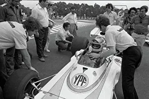 Prints of Argentine Formula One driver Carlos Lole Reutemann (1942 - 2021), in his car, talks to a crew member as others stand around them, at the Argentine Grand Prix, Buenos Aires, Argentina, January 28 Legends of the Track: Carlos Reutemann At The Argentine Grand Prix