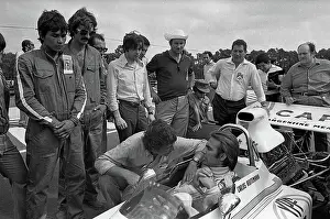Prints of Argentine Formula One driver Carlos Lole Reutemann (1942 - 2021), in his car, talks to a crew member as others stand around them, at the Argentine Grand Prix, Buenos Aires, Argentina, January 28 Legends of the Track: Carlos Reutemann At The Argentine Grand Prix