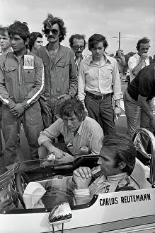 Prints of Argentine Formula One driver Carlos Lole Reutemann (1942 - 2021), in his car, talks to a crew member as others stand around them, at the Argentine Grand Prix, Buenos Aires, Argentina, January 28 Legends of the Track: Carlos Reutemann At The Argentine Grand Prix