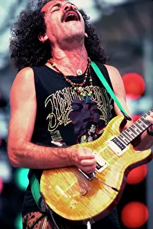 Iconic Concert Prints: Celebrate the Unforgettable Music Event That United the World: Carlos Santana On Stage