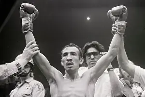 Carlos Zarate with Hands Held In Victory
