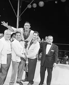 Carmen Basilio Held Up in Ring