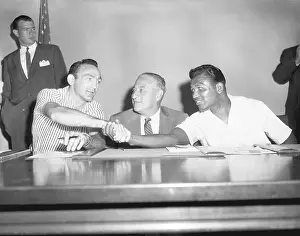 Carmen Basilio and Sugar Ray Robinson Shake Hands