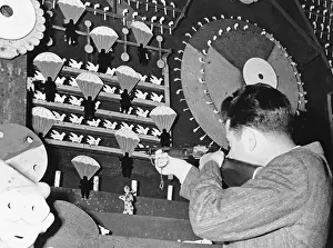 Carnival Goer Aiming at Target