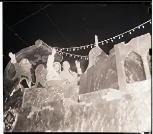 Sleigh Prints: Carol Ann and Wallace Beery on Float