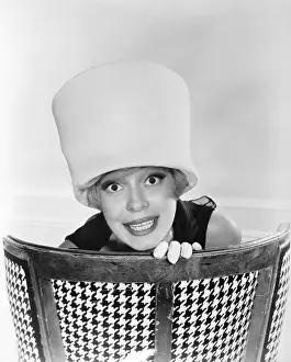Carol Channing Modeling a Hat