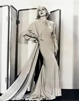 Carol Lombard Posing in Long Gown