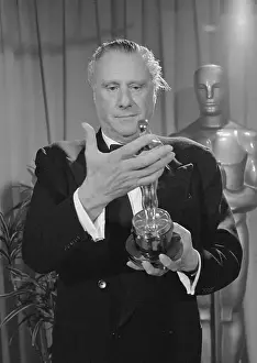 Carol Reed Holding His Academy Award