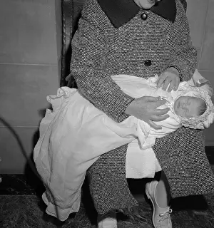 Caroline Kennedy Being Dressed in Baptismal Robes