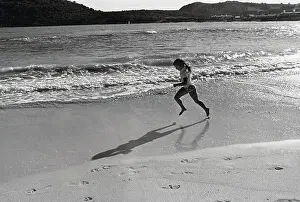 Caroline Kennedy Running on the Beach