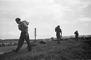 Felix Man Prints: Carrying Sacks