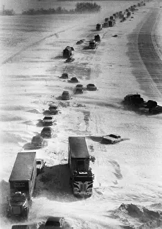 Blizzard Prints: Cars Abandoned on Snowy Highway