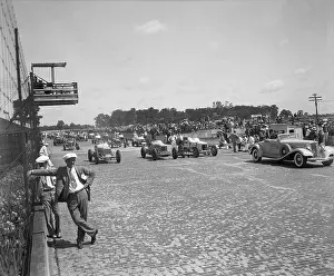 Racetrack Prints: Cars and Mechanics on Track