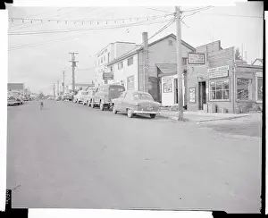 Cars Parked Along a Town Street