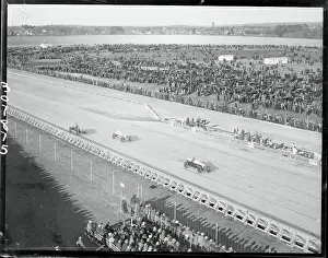 Cars Racing on Speedway