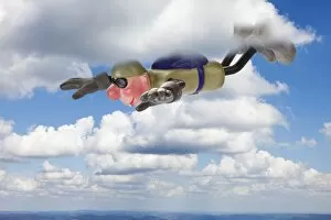 Cartoon character BASE jumper in gliding flight through clouds
