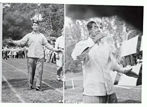 Cary Grant Balancing a Cup of Water on His Head