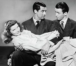 Prints of (Original Caption). Katharine Hepburn, Cary Grant and James Stewart in a scene from the movie: The Philadelphia Story. Movie still, 1940 The Legacy of James Stewart: A Cinematic Journey: Cary Grant, James Stewart, and Katharine Hepburn in the 1940 film The Philadelphia Story