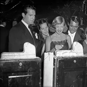 Bel Air Prints: Cary Grant and Others Playing Slot Machine