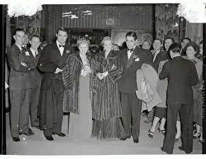 Cary Grant Posing with Other Stars at Premiere