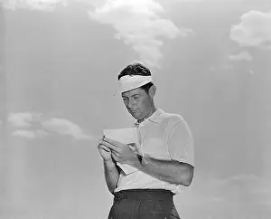 Cary Middlecoff Checking His Scorecard