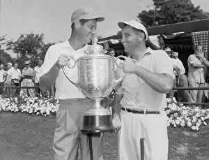 Cary Middlecoff and Doug Ford Holding a Trophy