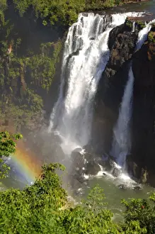 Cascades with rainbow Iguazu Waterfalls Argentina Brazil