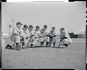 Phoenix Prints: Casey Stengel Bending to Talk to Players Crouched on Field