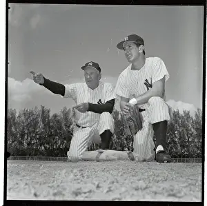 Casey Stengel and Billy Martin Kneeling and Conversing on Field