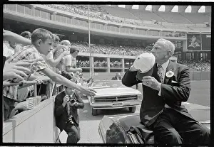 Casey Stengel Greeting Fans While Riding on Convertible