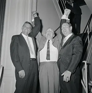 Casey Stengel Holding Arms of New Coaches