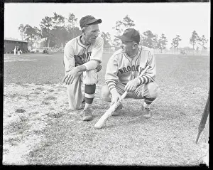Casey Stengel and Zack Taylor Kneeling on Field