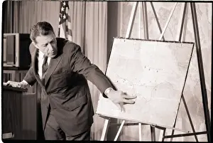 Attacking Prints: Caspar Weinberger Points to Map of Libya