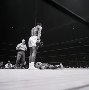Cassius Clay Over Fallen Zora Folley