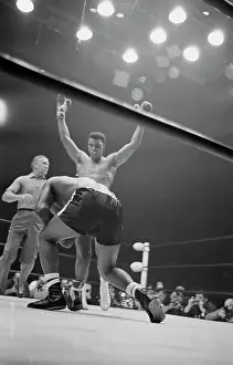 Cassius Clay Raising His Arms in Victory