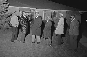 Cassius Clay and Reporters Standing Outside